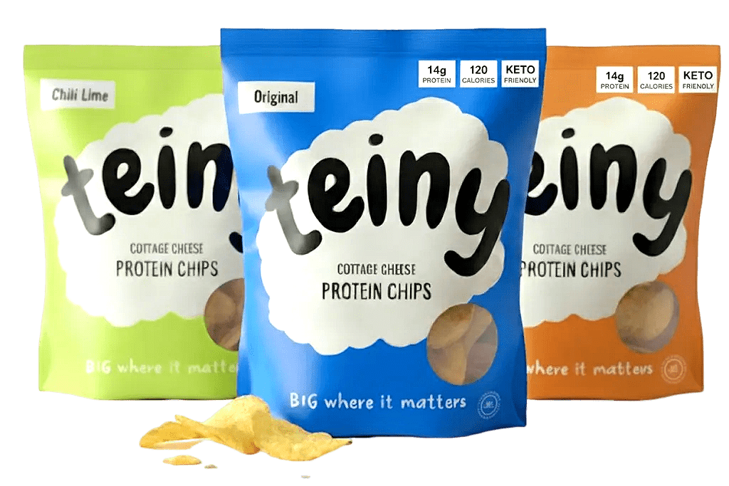 Three colorful bags of Peiny protein chips in different flavors.